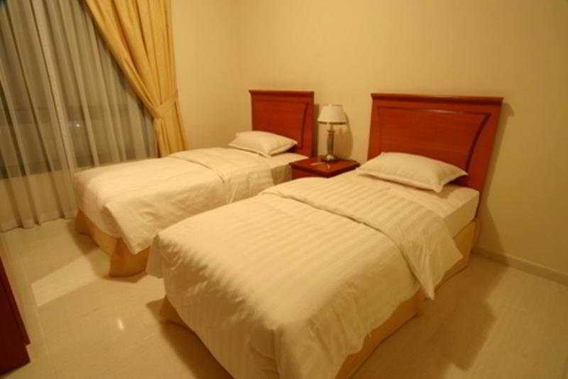 Emirates Palace Hotel Suites Sharjah Ruang foto